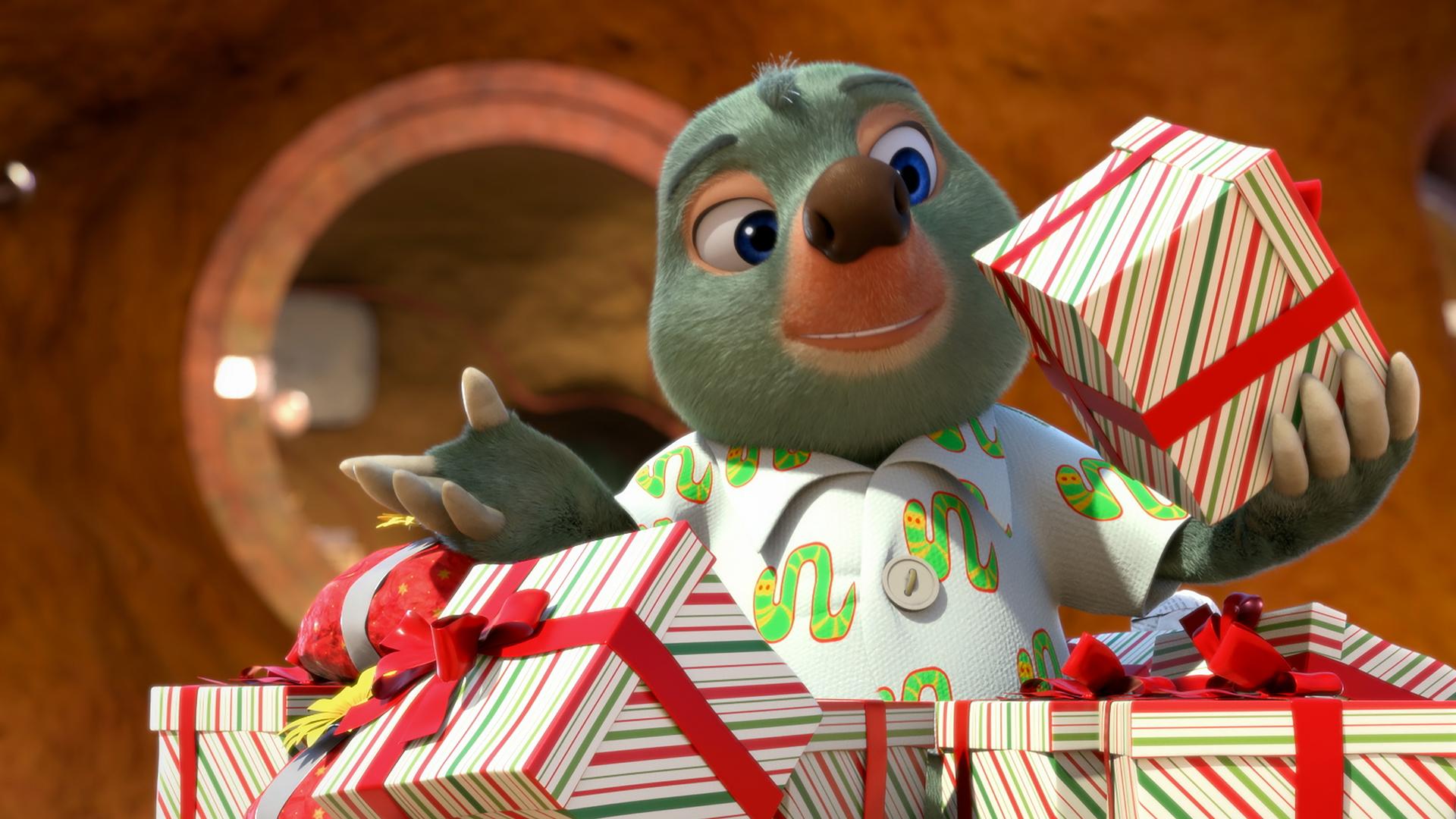 Maulwurf Moley steht vor dem Eingang seines Hauses inmitten eines Berges voller Geschenkpäckchen.