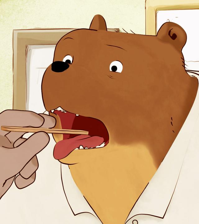 Ernest sperrt den Mund auf und der Arzt drückt mit einem Holzstab die Zunge herunter. Ernest schaut unglücklich drein.