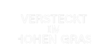 Versteckt im hohen Gras