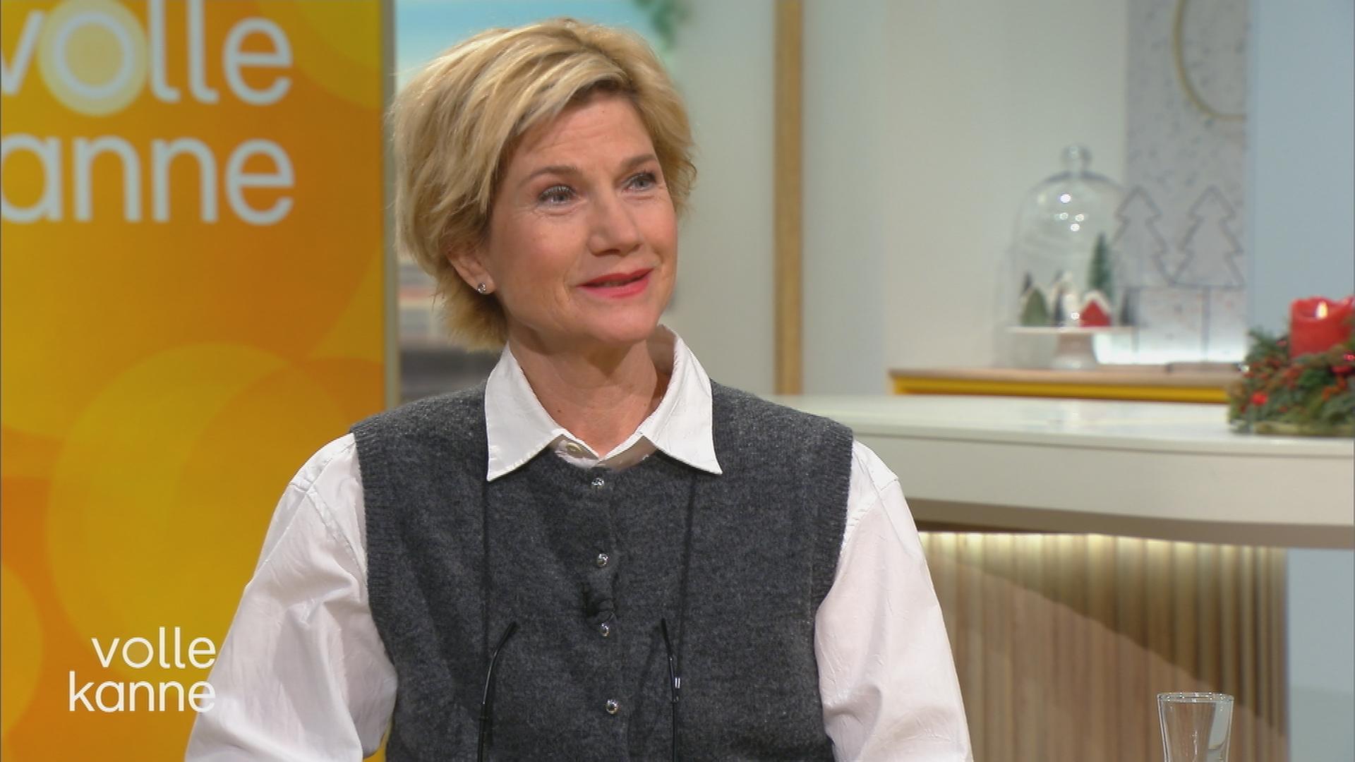 Astrid M. Fünderich am Volle-Kanne-Tisch