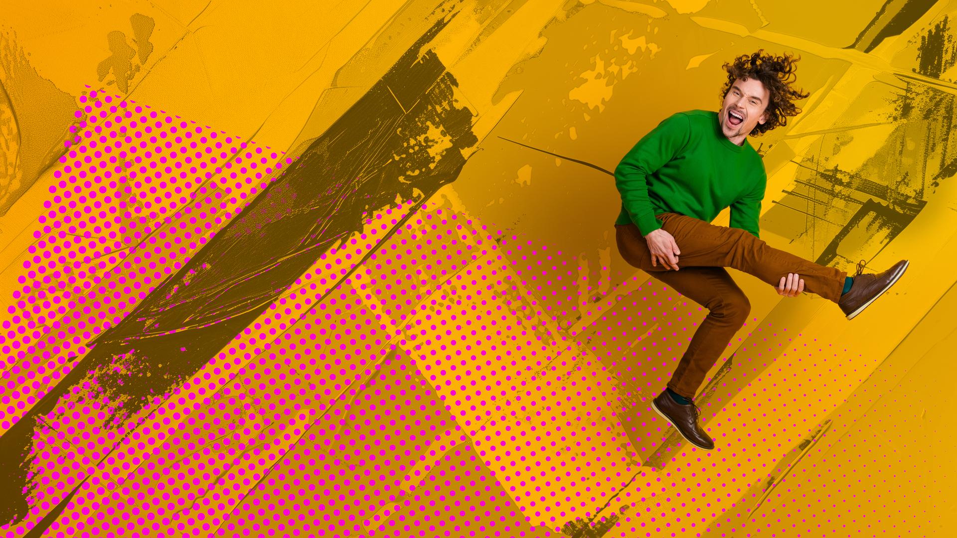 Mann, der in die Luft springt und sich an seinem Knie festhält