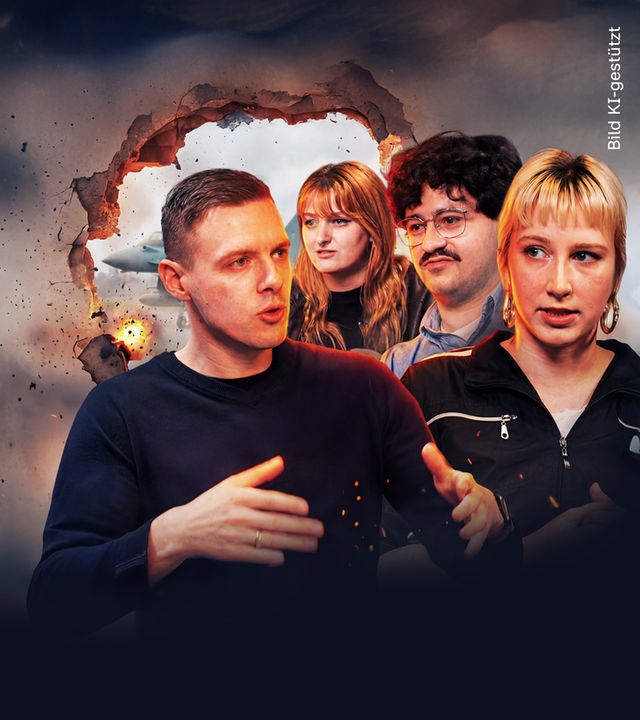 Vier Menschen, die vor einer Wand stehen, in die sich gerade ein Loch brennt.
