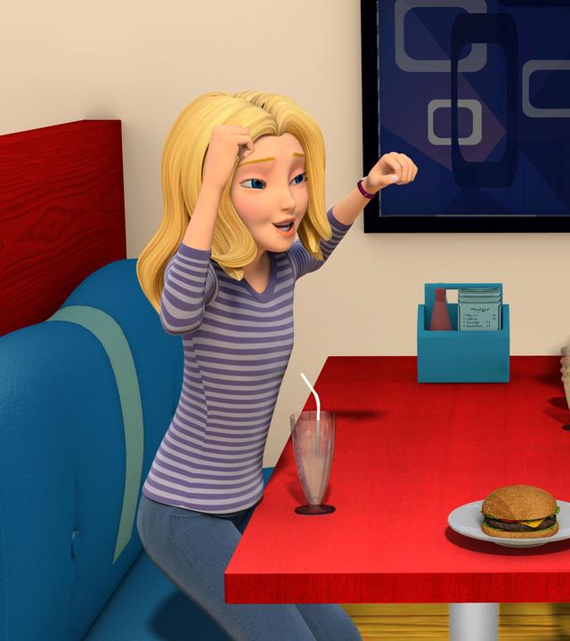 Wendy jubelt im Restaurant, weil sie Teamvorsitzerin geworden ist.