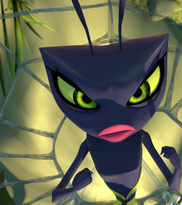 Wendy hängt in einem Spinnennetz fest. Sie sieht wütend aus und hat die Fäuste erhoben.