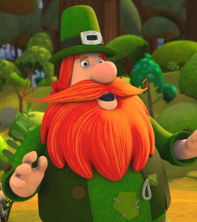 Puck der Gaukler steht aufgeregt im Wald und sucht seinen Freund Bernhard. Er hat einen kräftigen Bart und trägt einen hohen Flizhut.