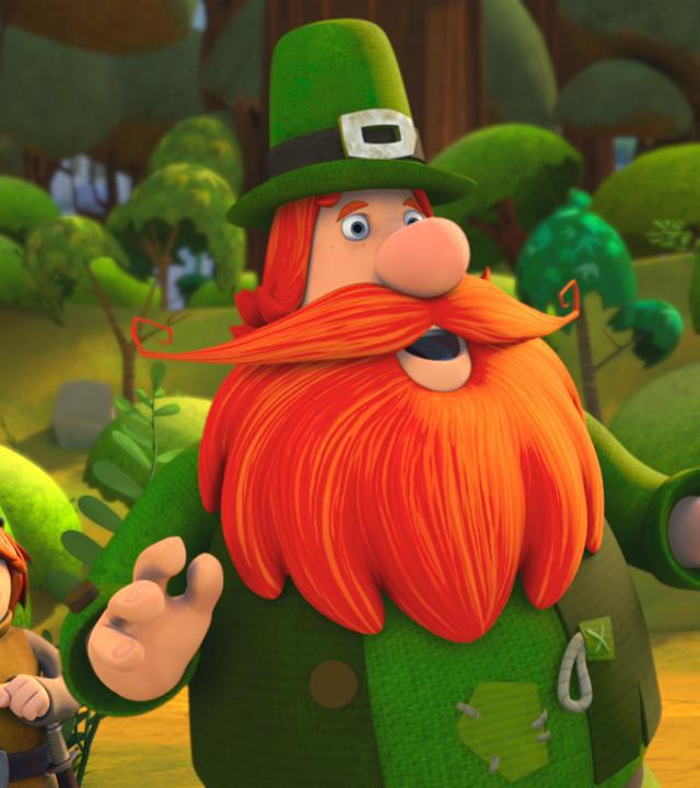 Puck der Gaukler steht aufgeregt im Wald und sucht seinen Freund Bernhard. Er hat einen kräftigen Bart und trägt einen hohen Flizhut.