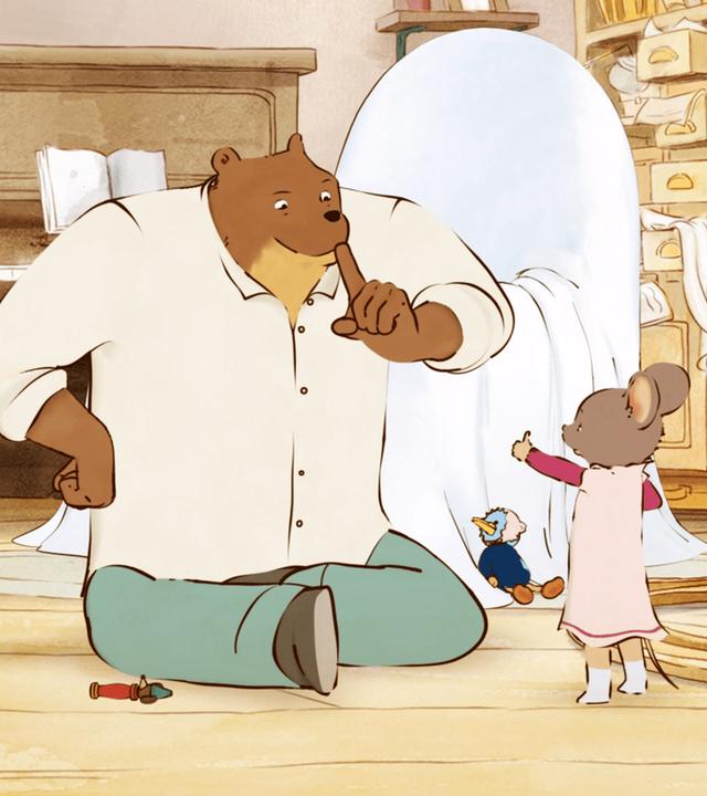 Ernest sitzt vor seinem Sessel im Schneidersitz auf dem Boden und hält sich den Zeigefinger vor den Mund. Celestine steht vor ihm und hält ihren linken Daumen hoch. Rechts neben ihr ist eine Holzeisenbahnstrecke aufgebaut, die über einen Schemel führt. Rechts an der Wand steht eine Wanduhr, ein Regal, hinter Ernest ist ein offenes Klavier und daneben ein Besen zu sehen.