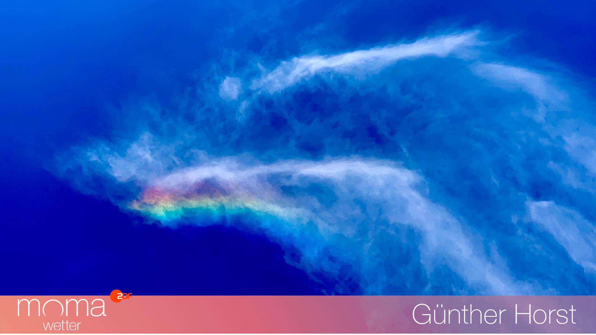 Wolkenadler mit Regenbogeneffekt