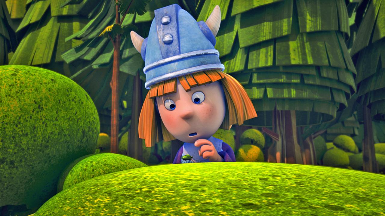 Wickie schaut sich verwundert eine Stinkwanze an, die vor ihm über einen kleinen Busch läuft.