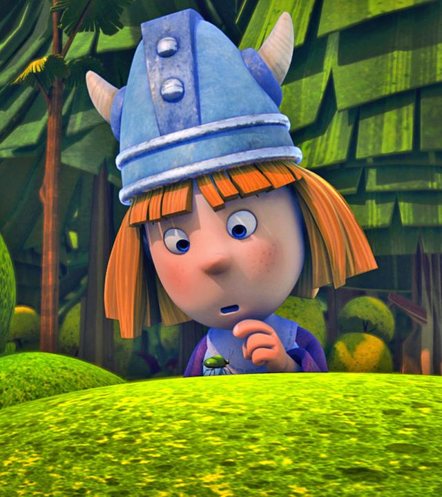 Wickie schaut sich verwundert eine Stinkwanze an, die vor ihm über einen kleinen Busch läuft.