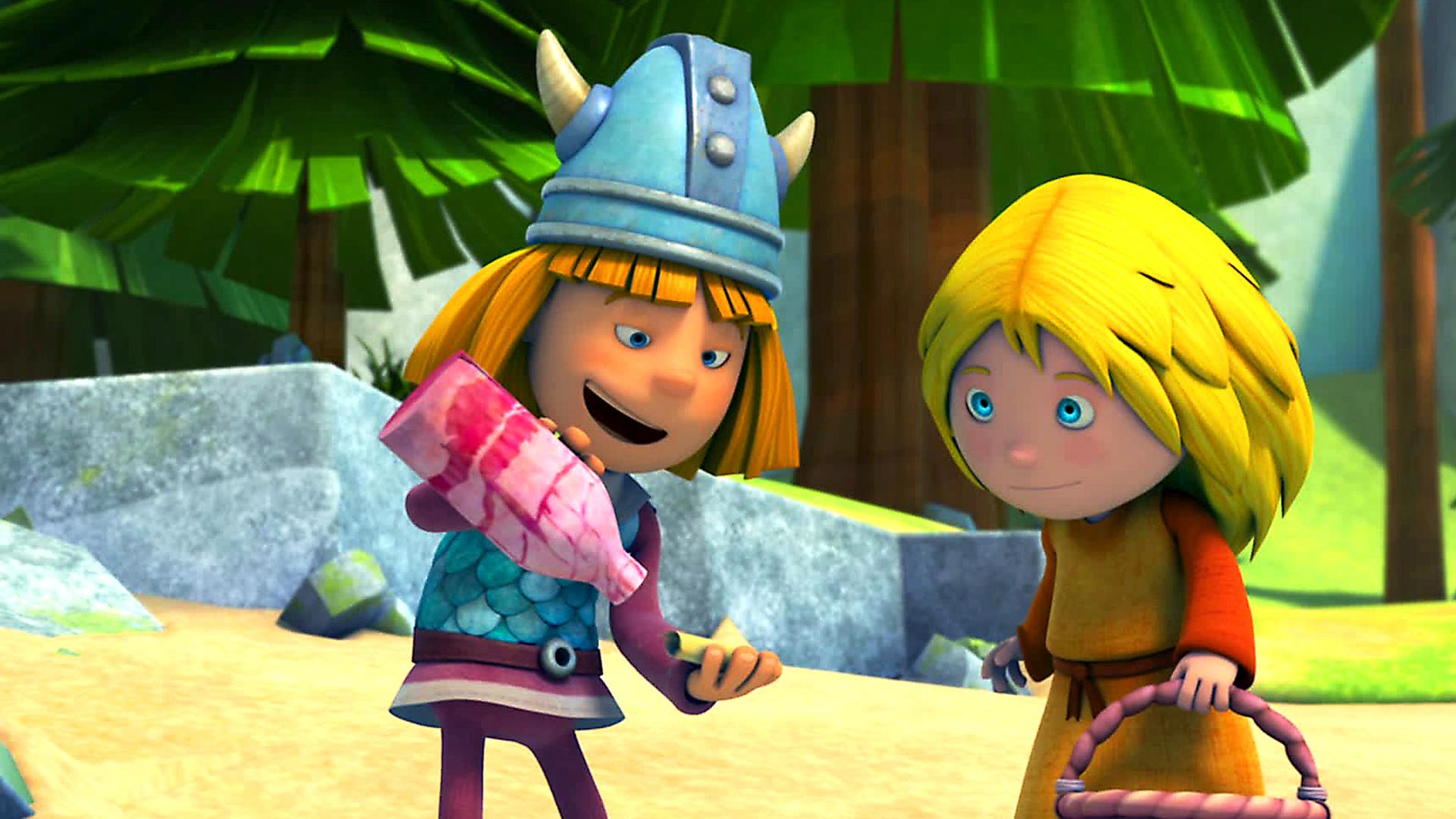 Wickie schüttelt den Brief aus der Flaschenpost. Ilvy steht rechts neben ihm und sieht ihm zu.