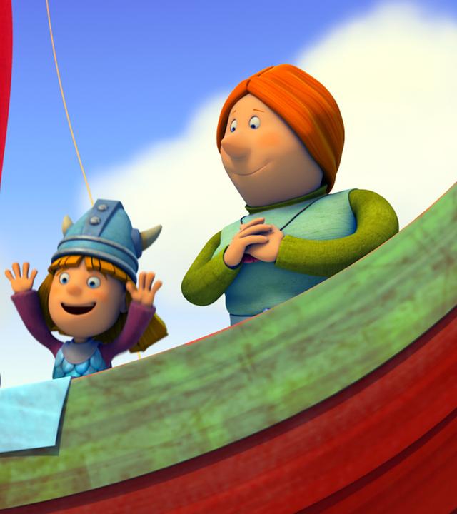 Die Frauen und Wickie stehen auf dem Drachenboot an der Reling.