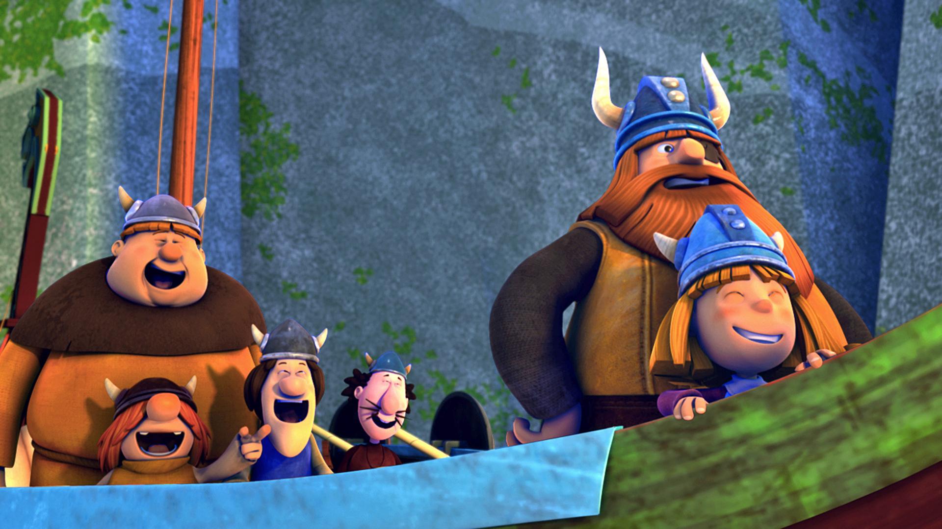 Die Wikinger stehen lachend auf dem Boot. Rechts stehen Wickie und Halvar, links hinter ihnen die übrigen Wikinger.