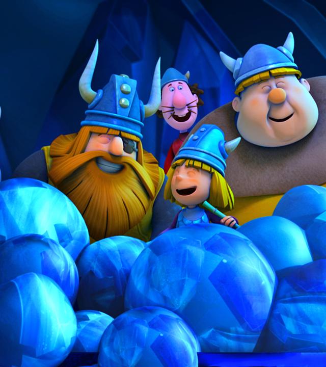 Halvar, seine Männer und Wickie, lachend in der Höhle der gefrorenen Stimmen.