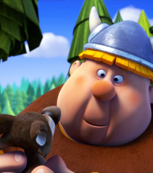 Faxe sieht das Wolfsjunge an, das er gefunden hat.