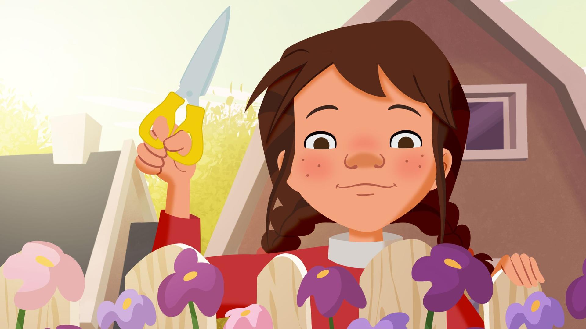 Tara sucht Rosen für das Parfüm heraus und hat eine Gartenschere in der Hand.