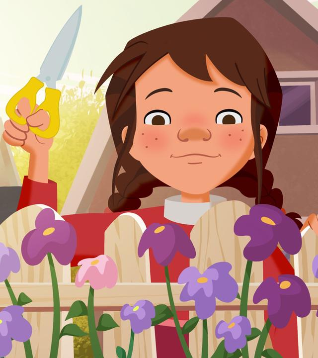 Tara sucht Rosen für das Parfüm heraus und hat eine Gartenschere in der Hand.