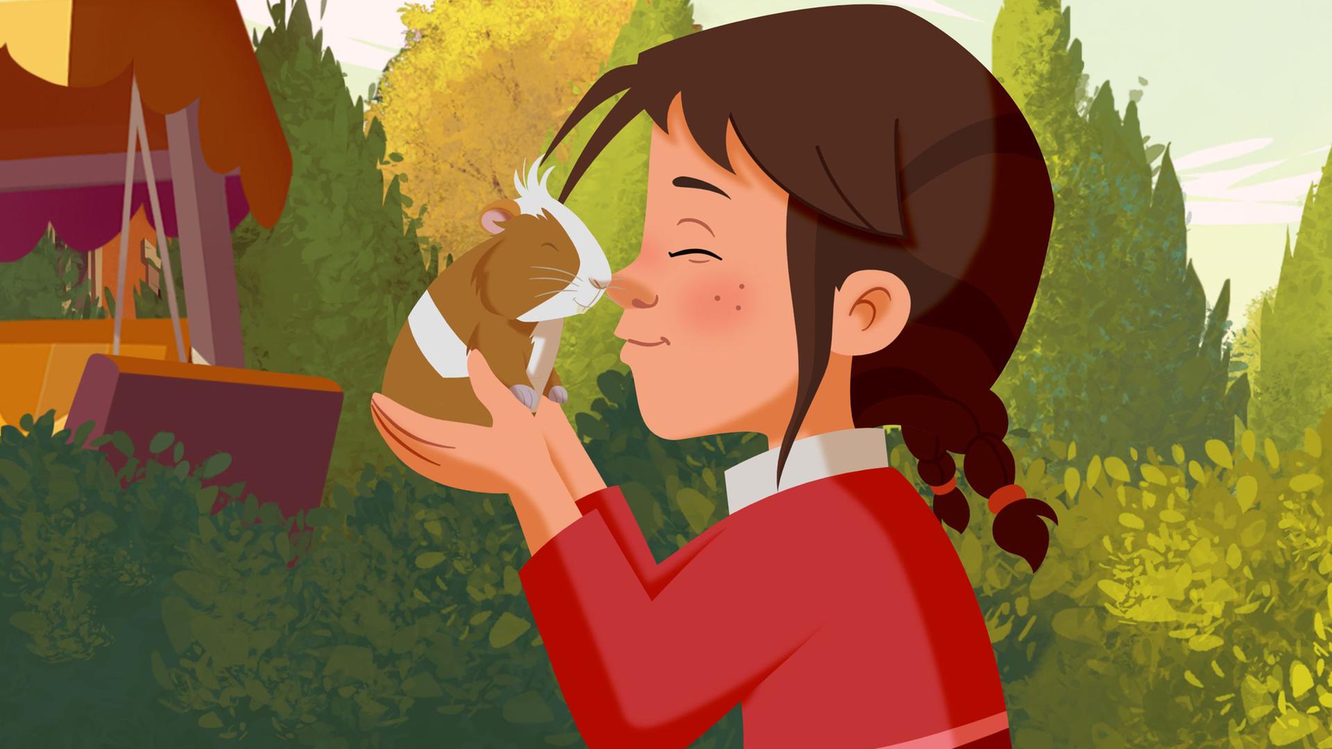 Tara kümmert sich um das neue Meerschweinchen. Sie trägt es in ihren Händen und hält ihre Nase an die des Meerschweinchens. Dabei lächelt sie fröhlich.