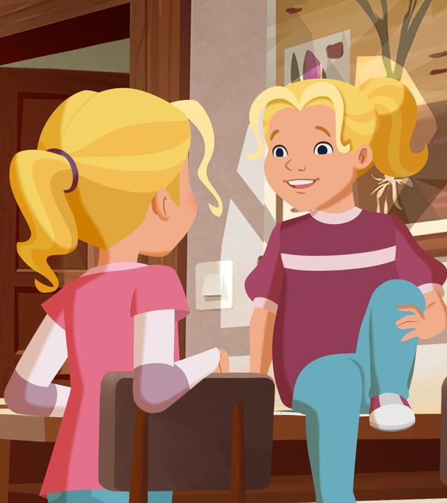 Tienecke sitzt auf Taras Sitzplatz und schaut auf die Mädchen herab.