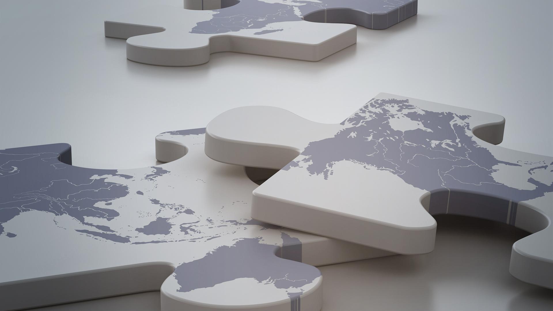 Puzzleteile mit Karte von Asien, Europa und Afrika