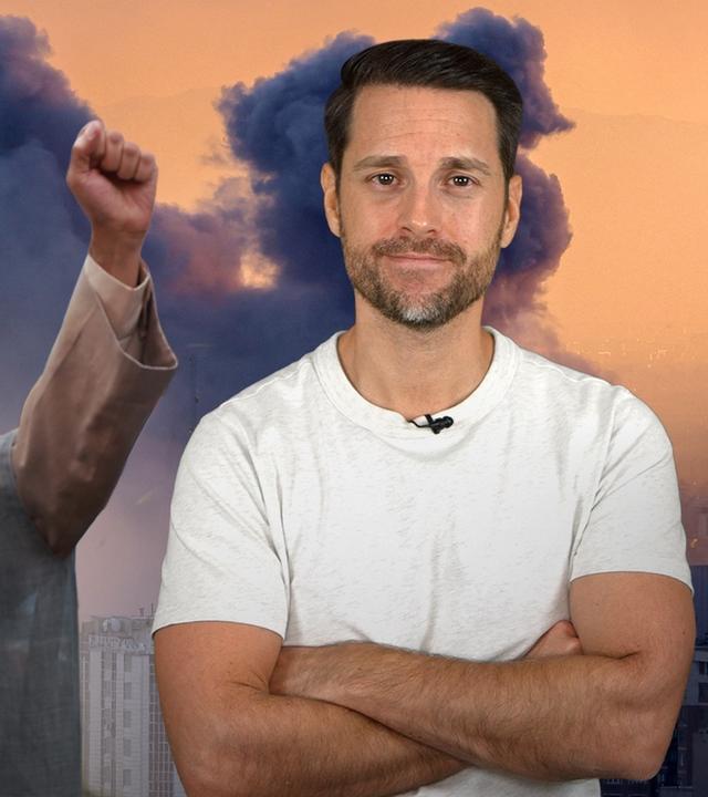 Auf der rechten Seite des Bildes zu erkennen ist eine protestierende Person aus dem Iran, auf der linke Seite zu sehen ist Host Mirko Drotschmann