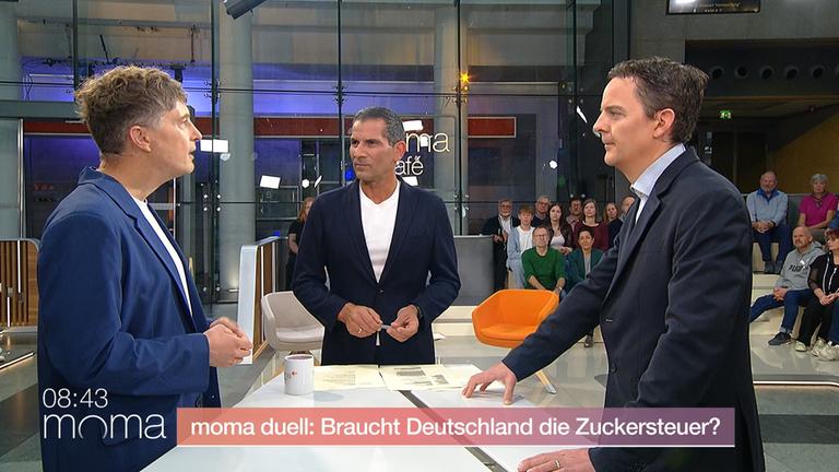 zucker-steuer-moma-duell-